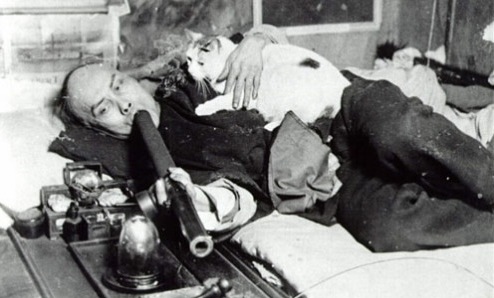 Man smoking opium with his cat